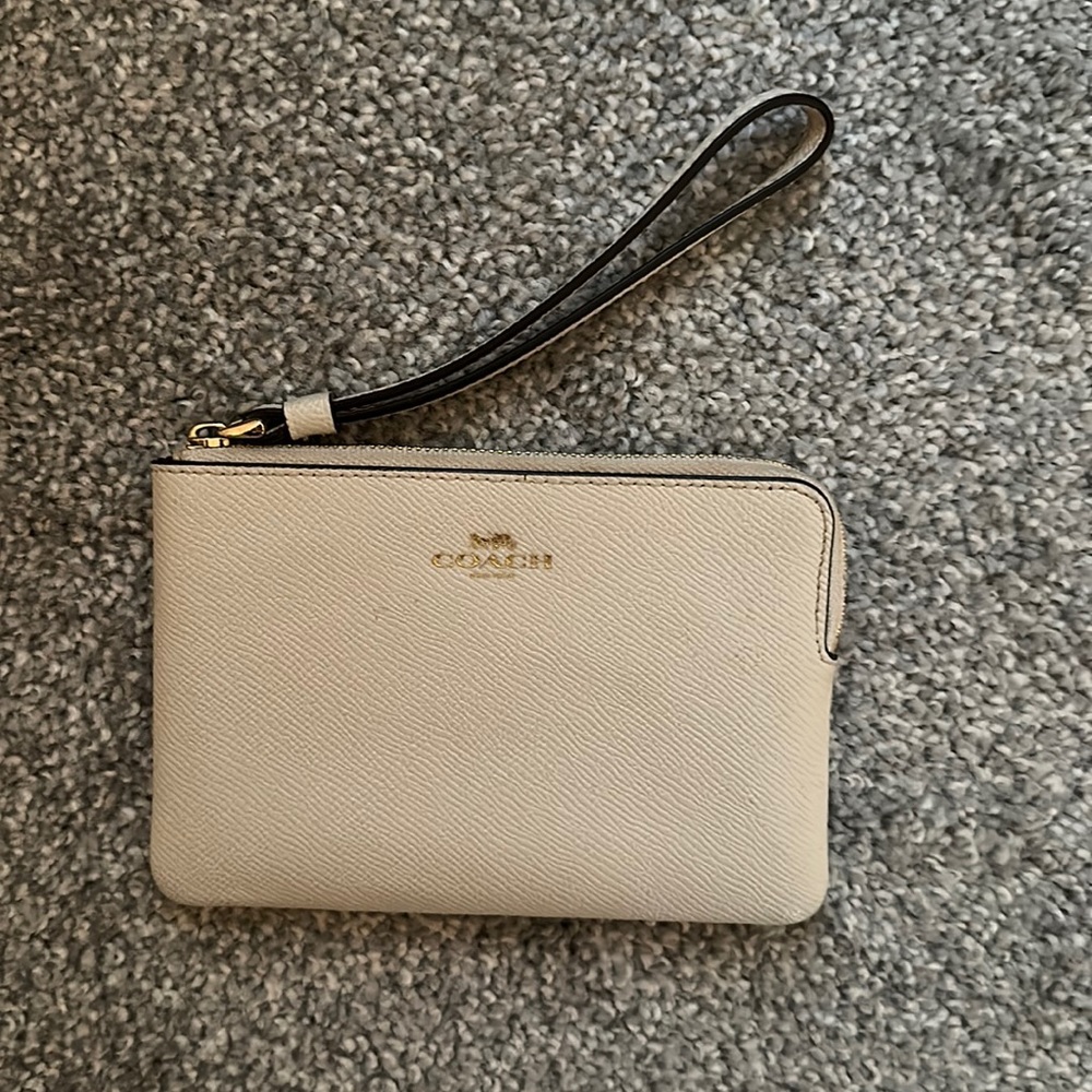 Cream leather coach wristlet